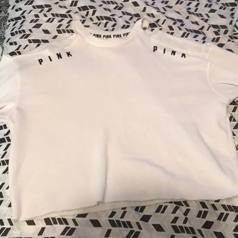 pink sweater shoulder cut